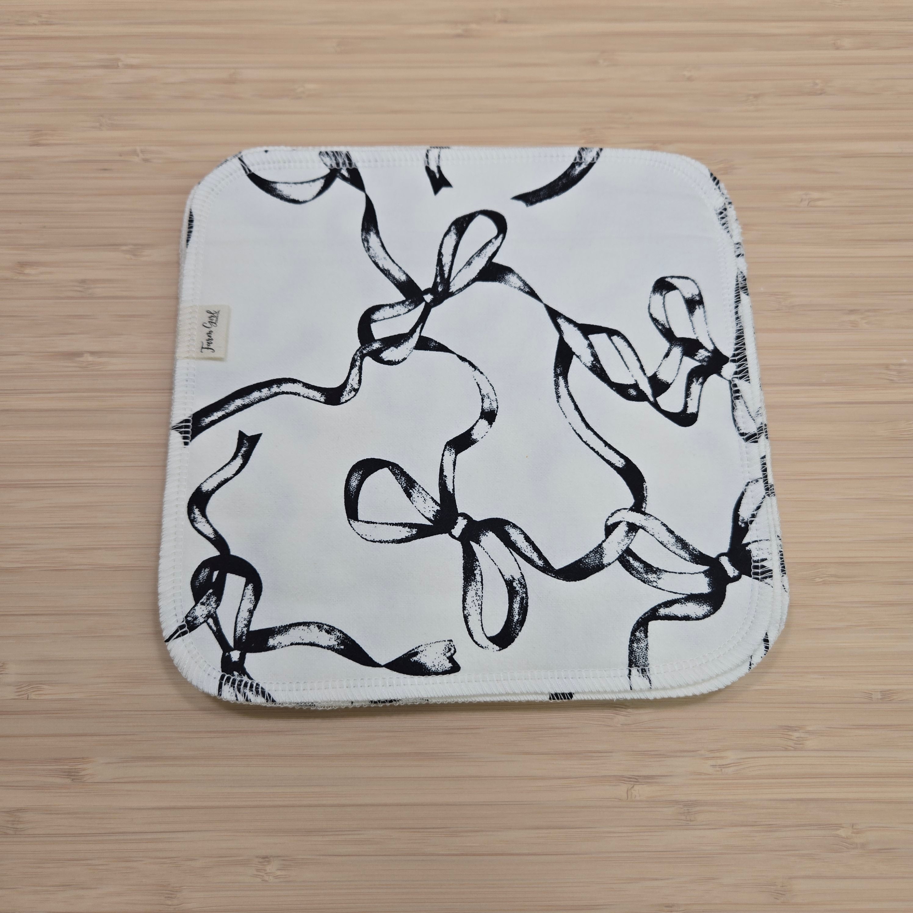 Stoffservietten | Schwarz-weiße Schleifen